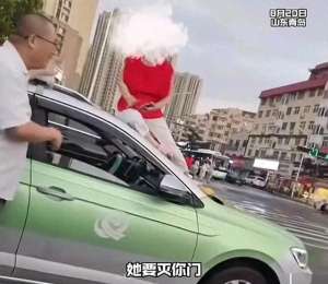 跳西湖美女(越闹越大 当街裸舞女子凭一己之力，再将青岛送上热搜 大爷看呆了)